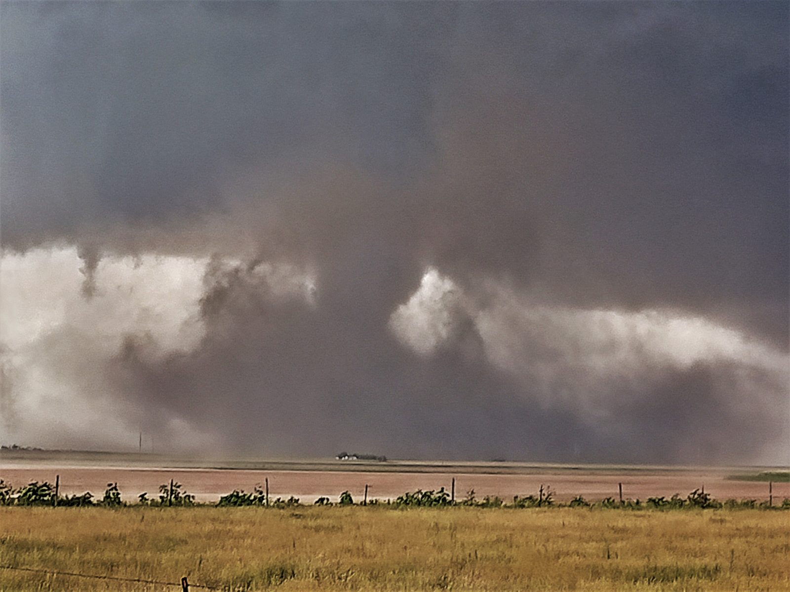 Dusty cone tornado near Yuma, Colorado
