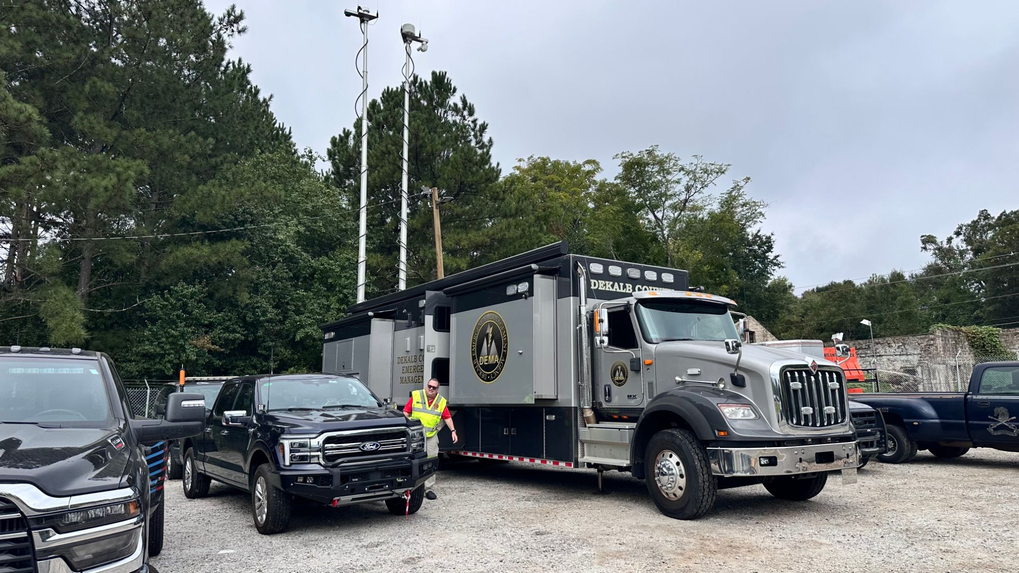 The DeKalb County Emergency Management mobile command vehicle parked with its masts raised