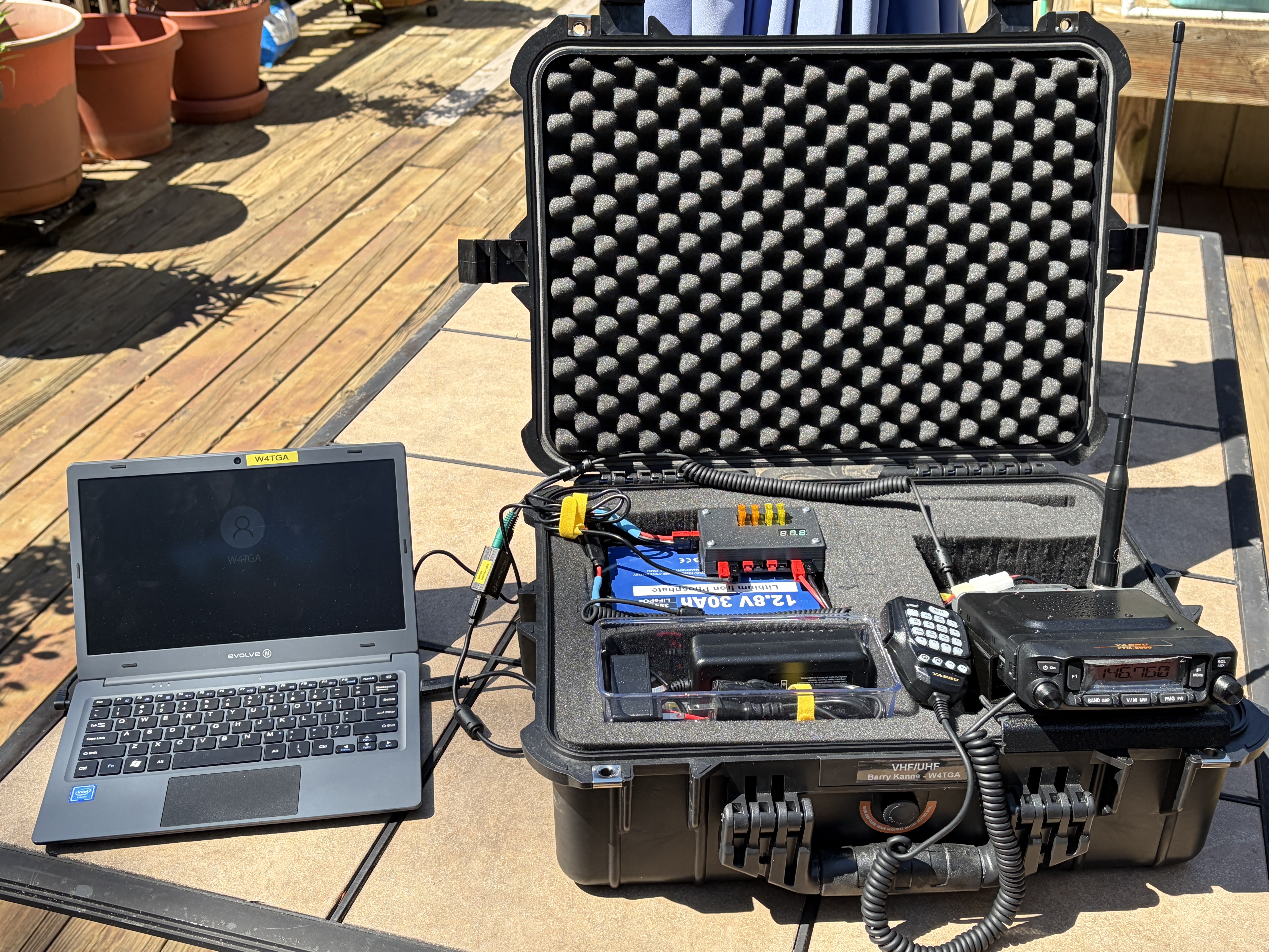 W4TGA's go-kit on the air — laptop powered, Yaesu FTM-6000 tuned to 146.760, antenna mounted, the entire station running off the internal battery.